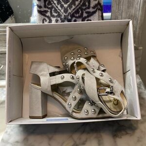 Tan sandal with silver studs worn twice